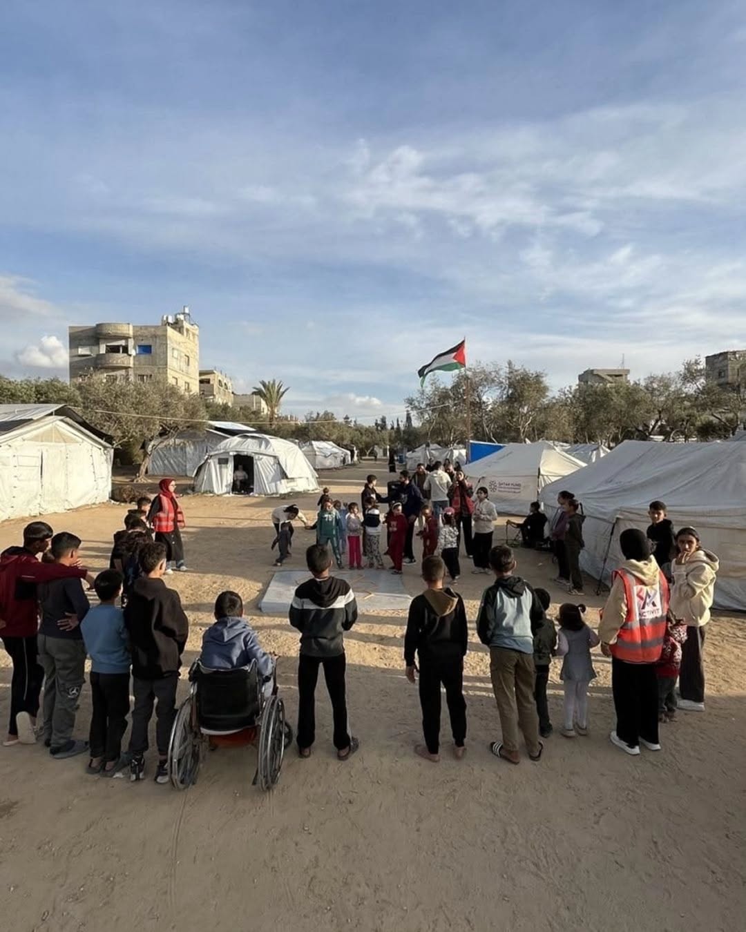 Community gathering in Gaza featuring activities organized by the Activit team