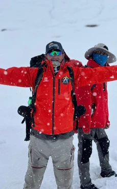 Activit athlete standing in snow during outdoor sports activity