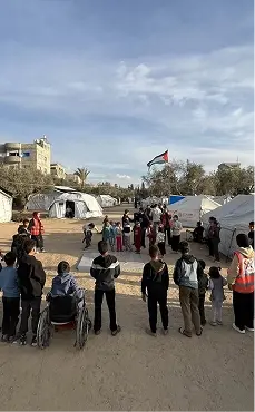 Group photo of the Activit team in Gaza during a community engagement event